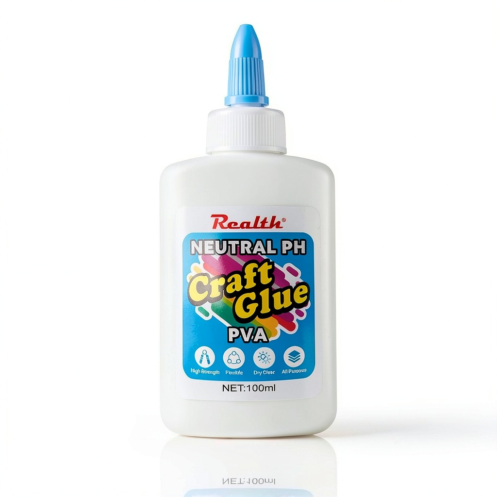 Applying Realth PVA craft glue to a scrapbook page